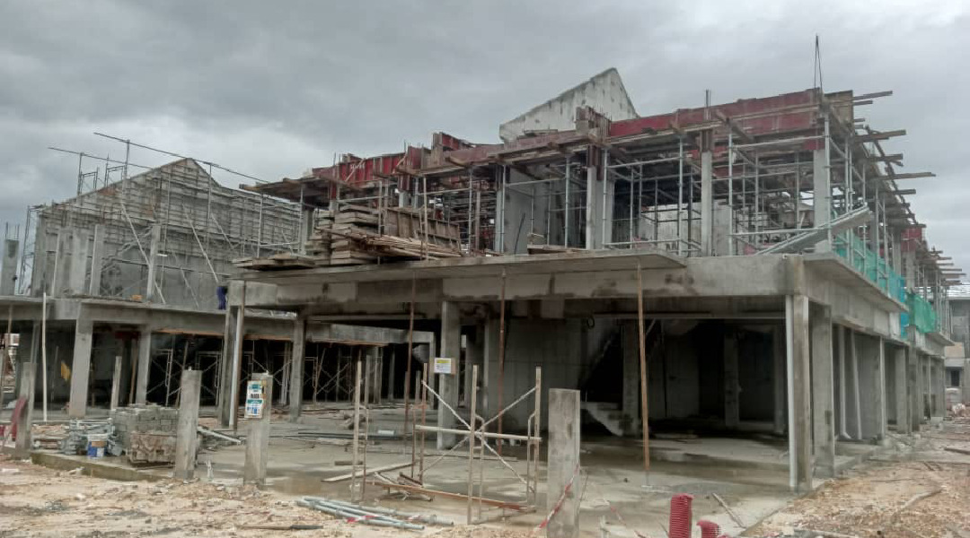The progress of walls of the said building with door and window frames placed in position as of 22 Dec 2025